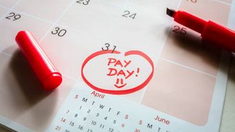 Term-time worker entitled to National Minimum Wage for 52 weeks