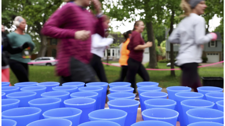This runner was bothered by blizzard of disposable cups at races. She invented something better
