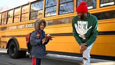 A boy was in tears because he didn't have PJs for Pajama Day. His bus driver came to the rescue.