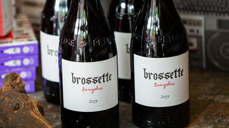 The message in a reusable wine bottle: Combat climate change