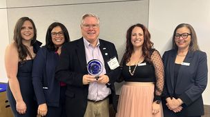 Alex Buckley, Mark Henriques, Womble Bond Dickinson Recognized for Pro Bono Support of the Safe Alliance