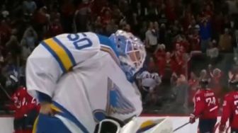 Attempted Hockey Puck Theft Foiled by Referees