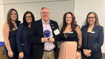 Alex Buckley, Mark Henriques, Womble Bond Dickinson Recognized for Pro Bono Support of the Safe Alliance