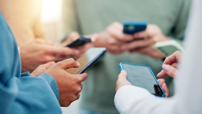 Community, phone and circle with hands of business people for connection, teamwork and share post link. Networking, online and coworking with group of employees for communication, app and synergy