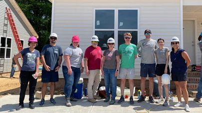 Womble Bond Dickinson's Triangle Offices Participate in 2023 Habitat for Humanity Build