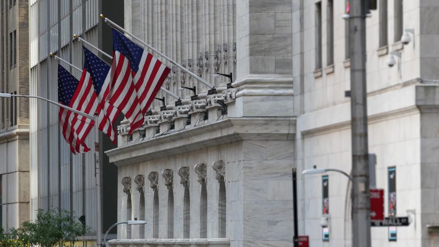 New York City Lower Manhattan Downtown Financial District, United States. Wall Street sign, stock exchange market building 1903, FiDi. American USA flag on facade. Trading finance and business concept