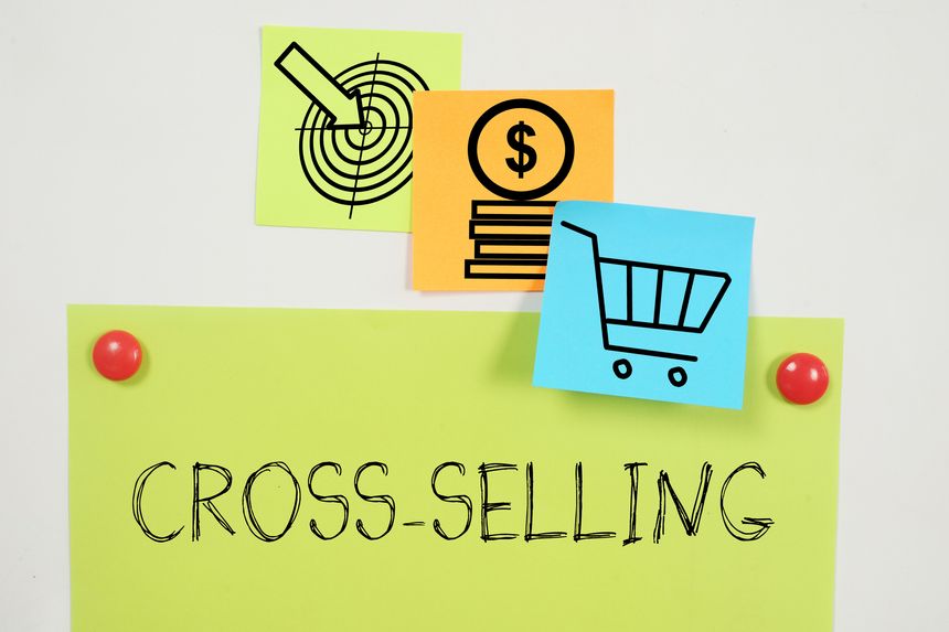 Cross-selling is a sales strategy that involves offering the customer additional products or services that complement their main purchase
