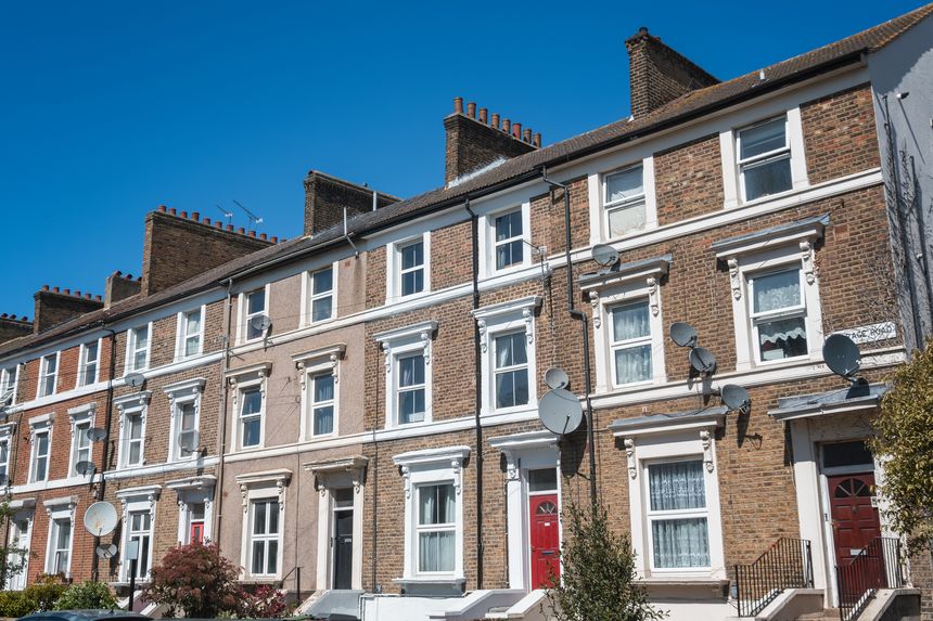 Row of traditional terraced houses in Leyton, East London, England