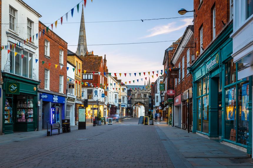 Aerial view of High street gate and Salisbury cathedral in the evening