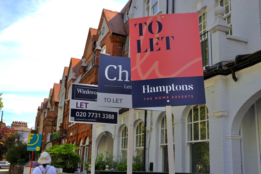 London, UK-June 8, 2021: Real estate agent "To let " signs in front of terrace house  in London.