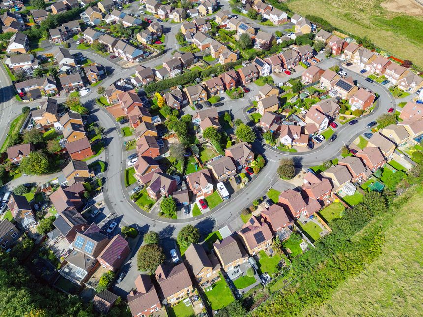 Pontyclun, Rhondda Cynon Taf, Wales, UK - 23 September 2025: Aerial view of a housing development of detached homes in south Wales