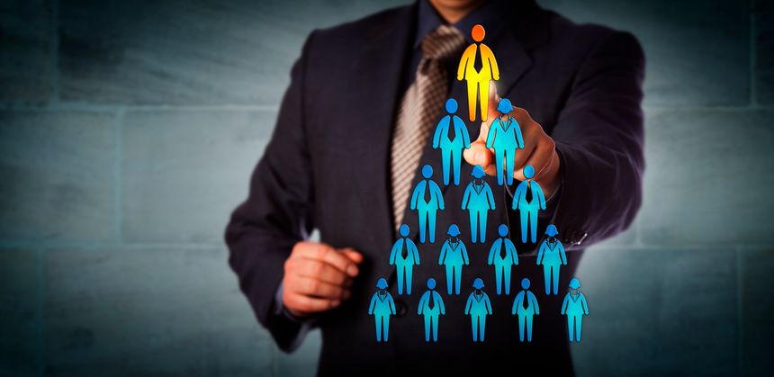 Blue chip recruitment manager selecting the employee icon atop a pyramid structure. Business concept for talent management, network marketing, career success, corporate hierarchy and promotion.