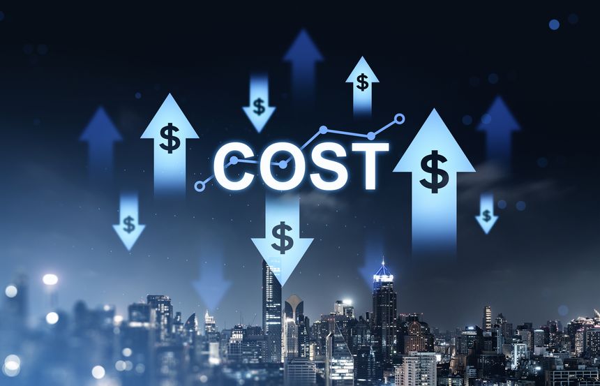 Upward and downward dollar arrows with cost text in glowing modern style on dark city skyline background expressing economic concept