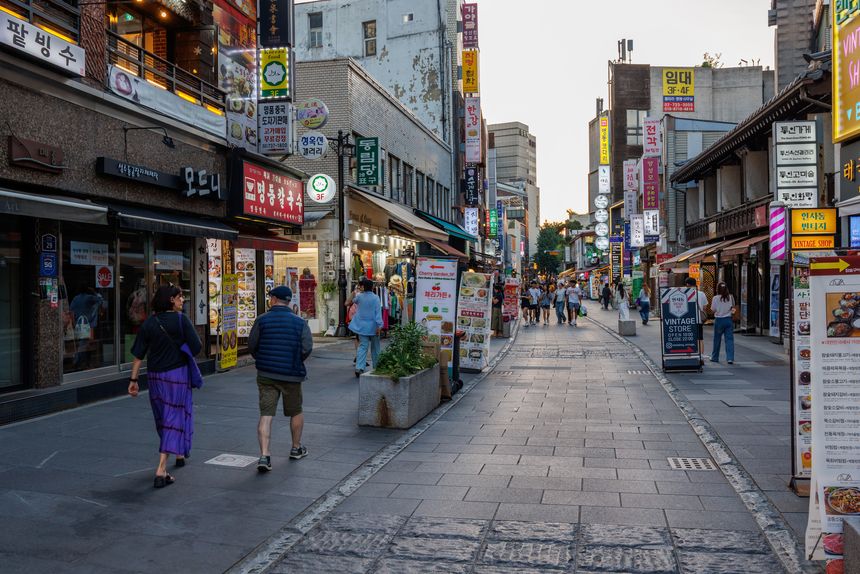 Seoul, South Korea - June 8, 2026: Visitors walk among shops, cafes and restaurants in the traditional Insadong district of Seoul.