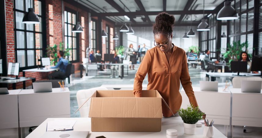 Woman Resigns Corporate Job, Moves Boxes Out After Office Layoff.