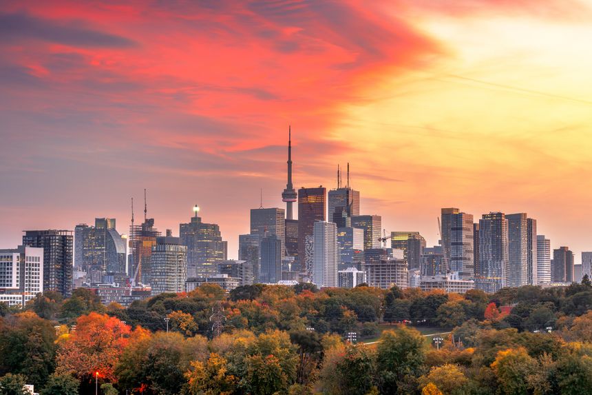 Toronto, Ontario, Canada park and cityscape  at dusk.