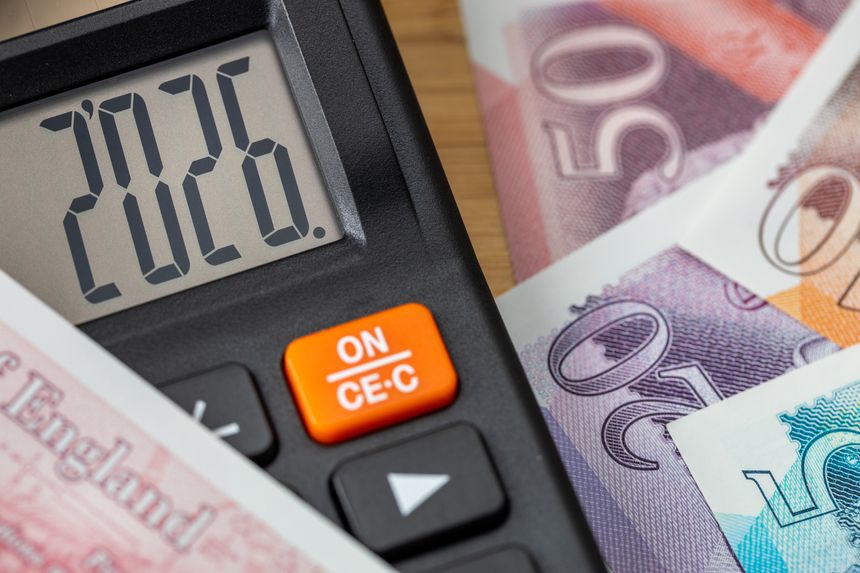 United Kingdom 2026 year. Financial business UK concept. Money and calculator with date 2026. Market analysis of GBP. British pounds exchange rate. Economic background. closeup