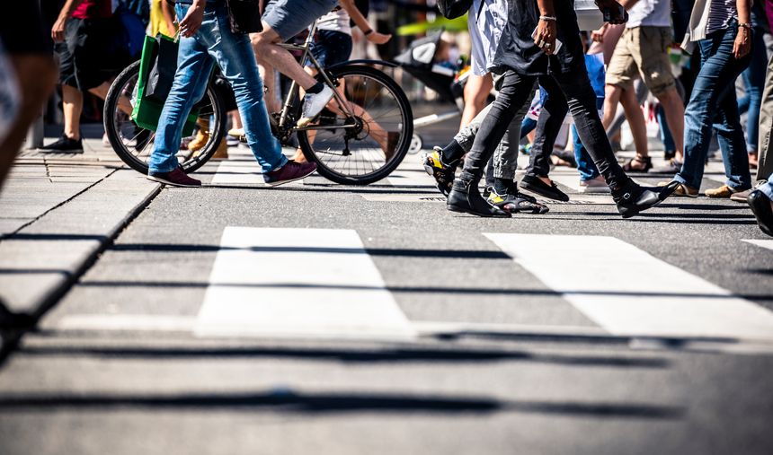 People on pedestrian crossings, on foot and by bicycle