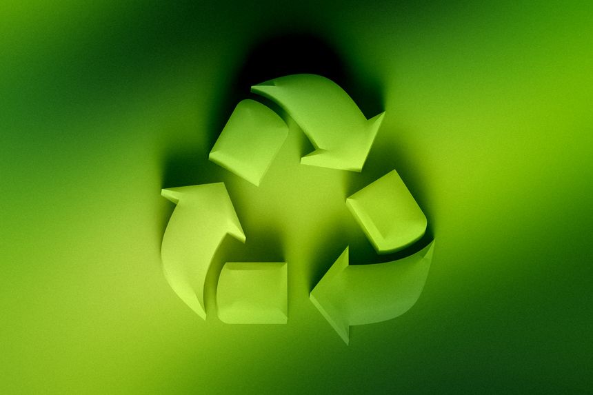 Recycling symbol on green gradient background