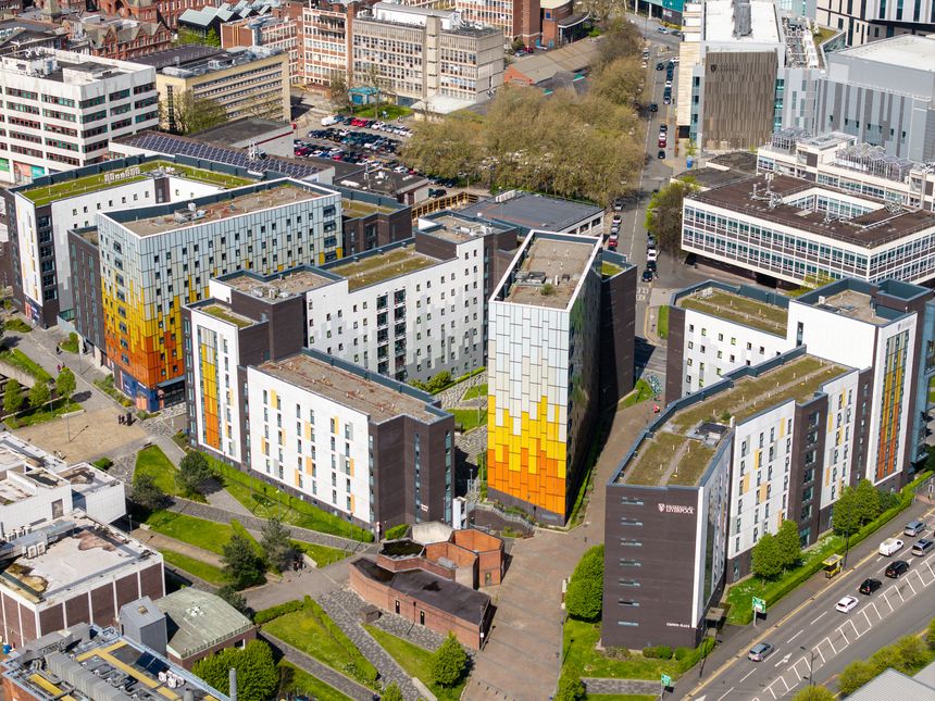 Liverpool, Merseyside, England - April 16, 2026: Aerial view shows the large-scale Crown Place student residential complex situated on the University of Liverpool campus in the Knowledge Quarter