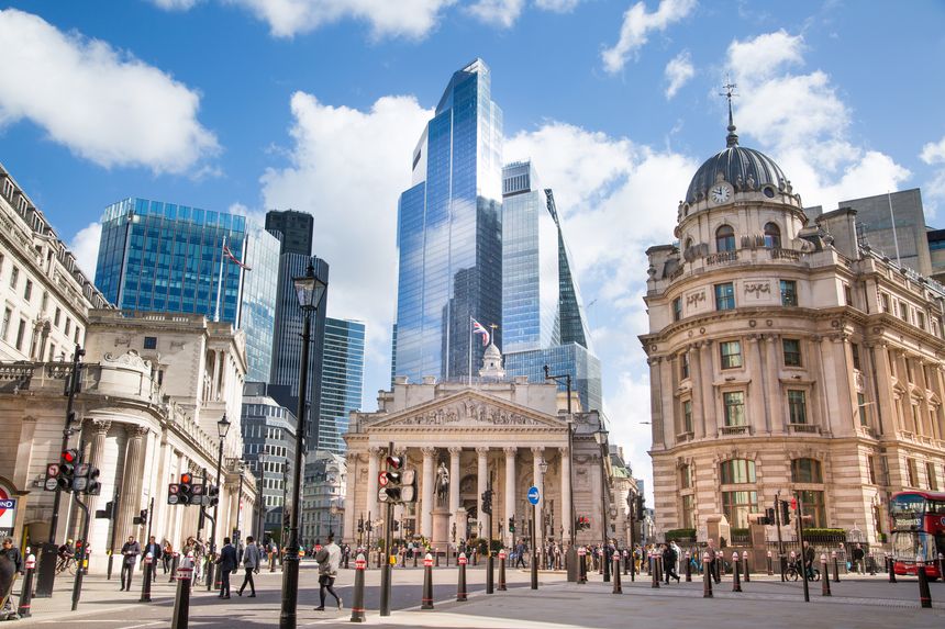 London, UK -September 22, 2025: Stock exchange building and skyscrapers the City of London at the background view from the Bank of England square