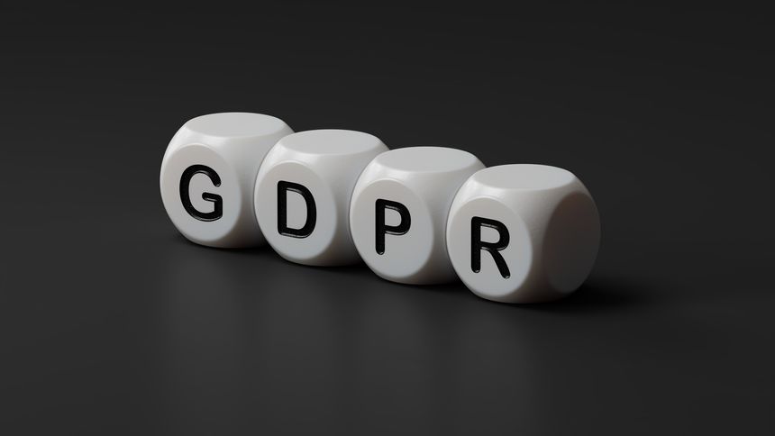 Business gdpr concept. Hand and fake on wooden dice block.close up of wooden dice,Business Concept.3D rendering on black background.