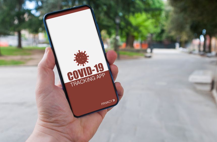 Man using a covid-19 tracking app to prevent contagion from coronavirus