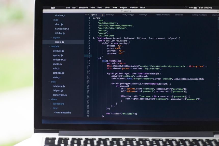 Close-Up Of Coding On Laptop