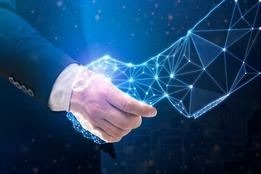 Businessperson shaking hand with digital partner over futuristic background. Artificial intelligence and machine learning process for 4th industrial revolution.