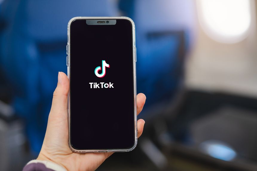 Closed up image of a Female using TikTok application on a smartphone in home. 11 August, 2024. Chiang Mai, Thailand.