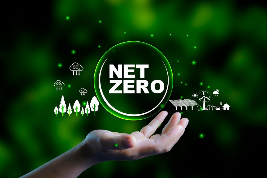 Net zero, carbon neutrality, Renewable energy concept. Net zero on hand and Green energy icon around it at green wall background, Renewable Sustainable. earth day ,friendly energy,