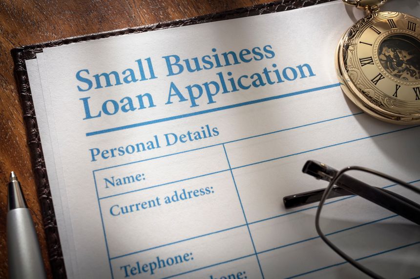 Small business loan application form on an office desk