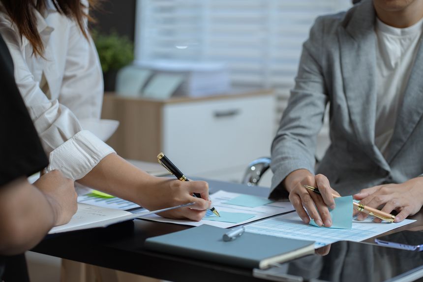 Project manager working and update tasks with milestones progress planning and professional investor working new start up project in the office