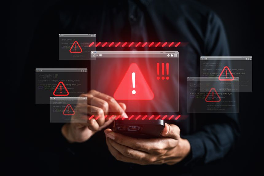 Cyber threat warning with red alert icons showing online danger. Concept of internet risk, hacking, malware, data breach, and digital security threats on mobile and smart technology platforms.