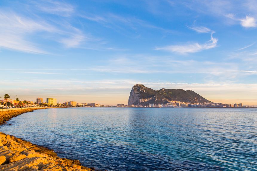 Amazing panoramic view on the rock of Gibraltar during sunset and the ships around it.
