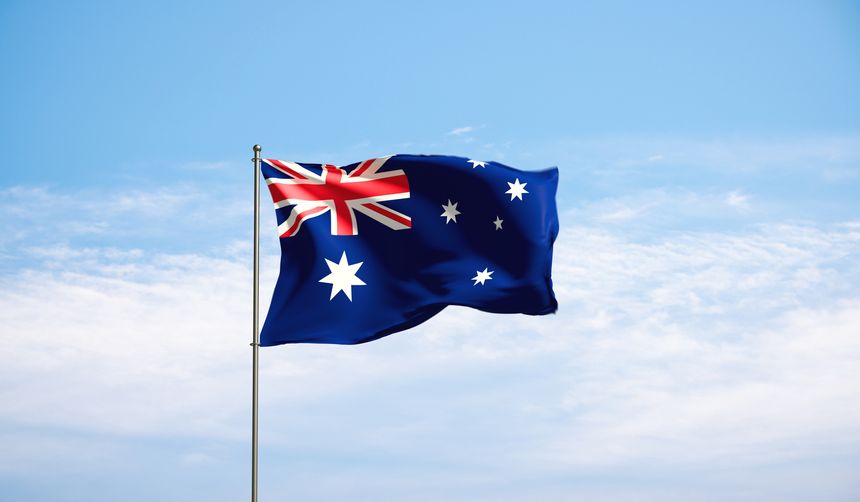 Flag Australia against cloudy sky. Country, nation, union, banner, government, Australian culture, politics. 3D illustration