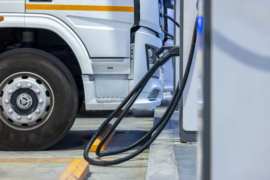 EV charging and semi truck electric vehicle, Electric vehicle semi truck trailer charging station for charge EV battery, Plug for vehicle electric engine, EV charger semi truck trailer station.