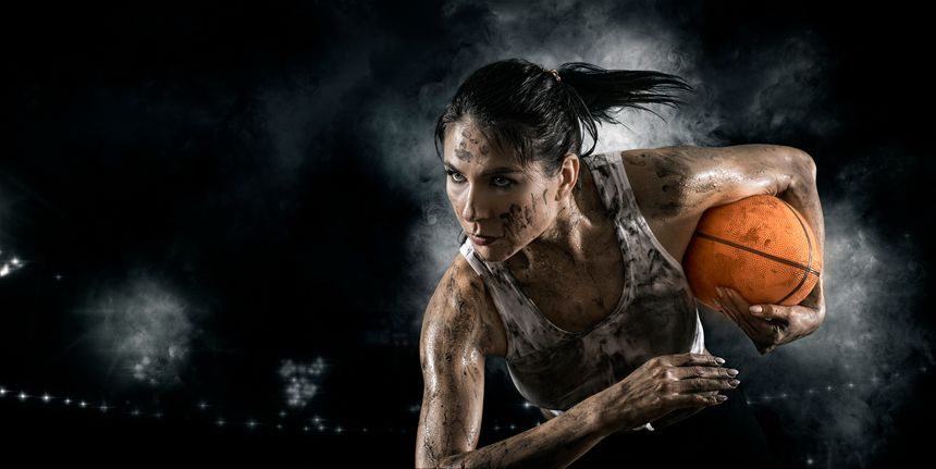 Handsome woman rugby player holds ball. Sports banner. Horizontal copy space background