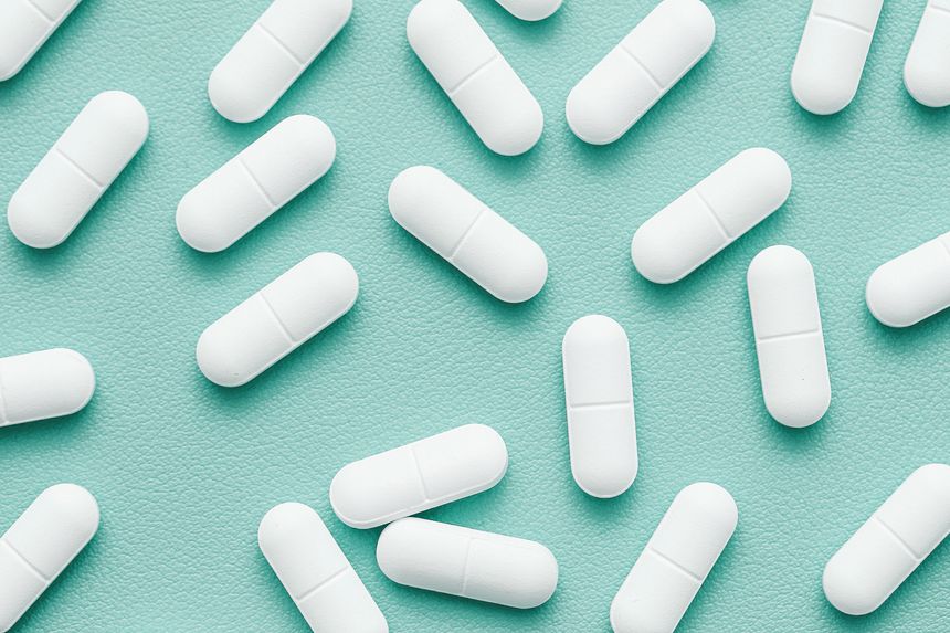 Medication and supplements concept. Healthcare treatment and daily dosage. Minimal medicine background.