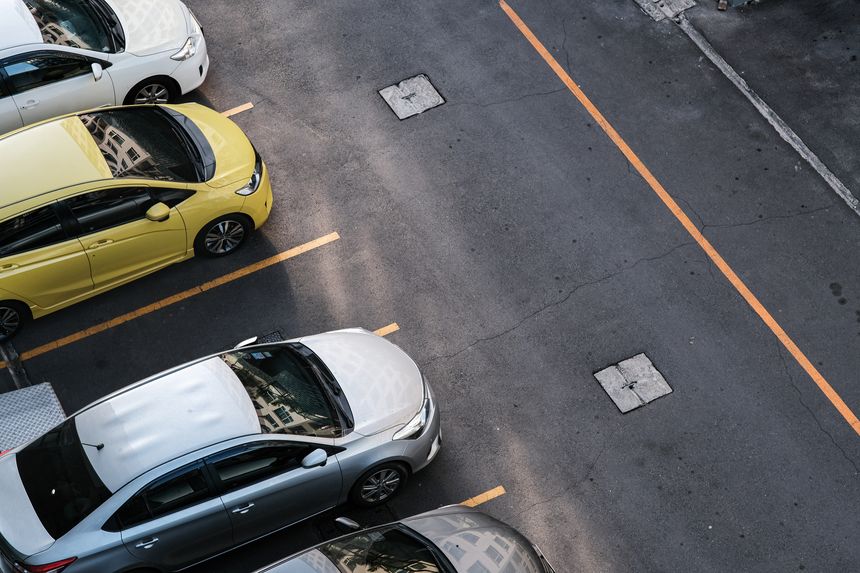 Aerial view colorful car parking lot in condominium resident transport background
