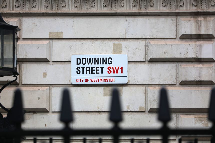 Downing Street sign in London. 10 Downing Street is the residence of British Prime Minister.