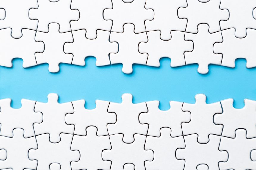 Plain jigsaw puzzle on a blue background