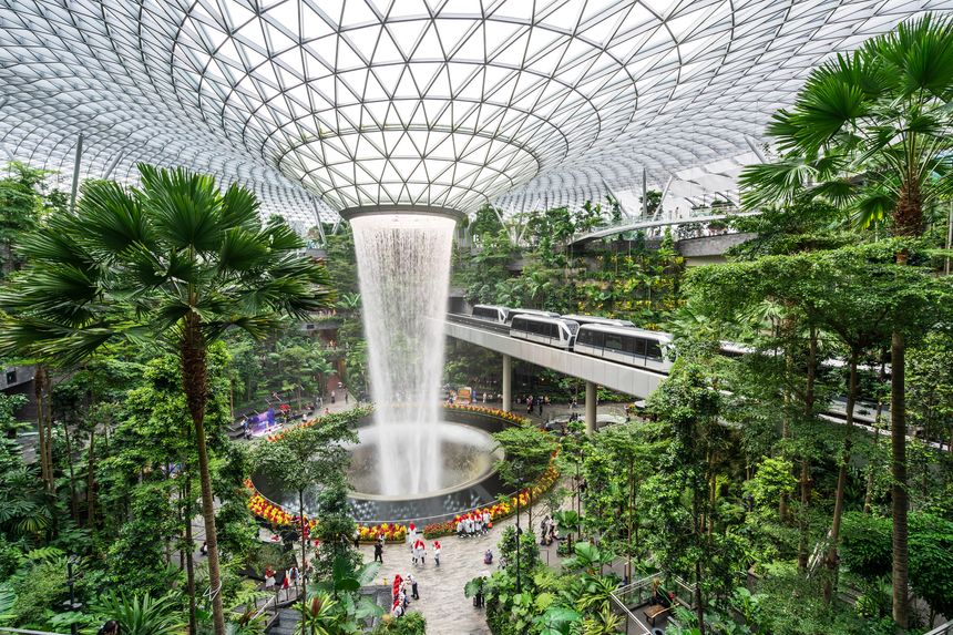 Singapore, Singapore - February 01, 2023: Jewel Changi Airport is a nature-themed entertainment and retail complex surrounded by and linked to one of the passenger terminals of Changi Airport, Singapore. Its centrepiece is the world's tallest indoor waterfall, the Rain Vortex