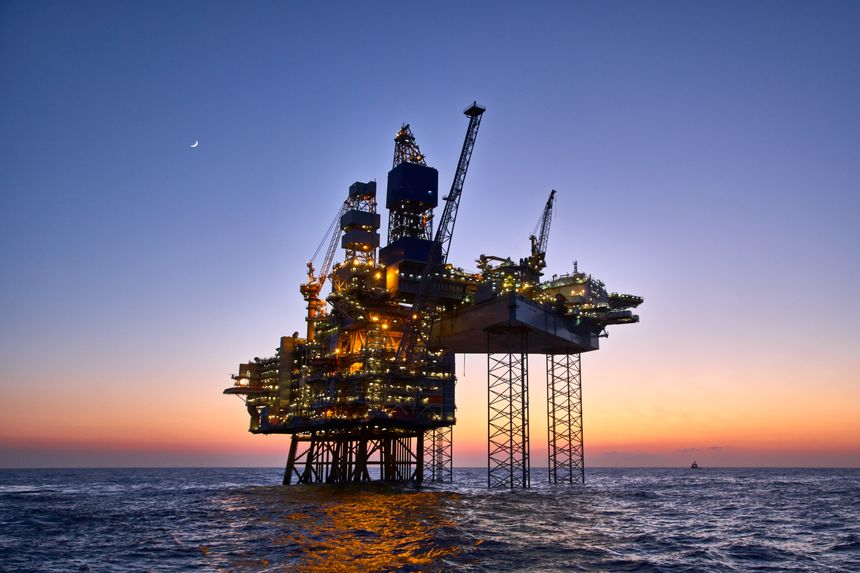Offshore oil and gas platform on production site. Jack up rig crude oil production in the North Sea.