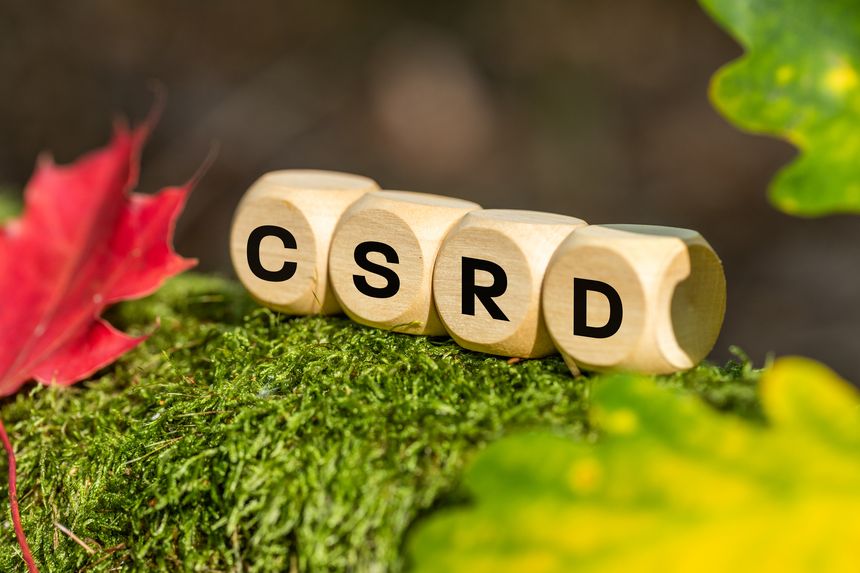 CSRD icon, Corporate Sustainability Reporting Directive. Wooden blocks and CSRD Symbol. Beautiful autumn colors. European Union Act, Reporting by companies of their impact on the environment, society, and corporate governance.