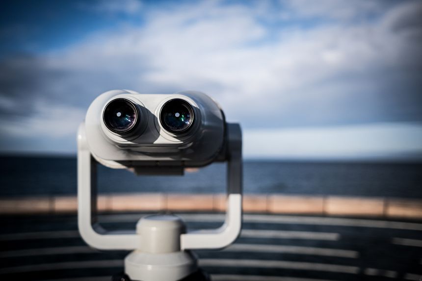 coin operated binoculars on the beach
