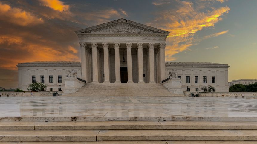 Supreme Court building in Washington DC after rain with sunlight clouds