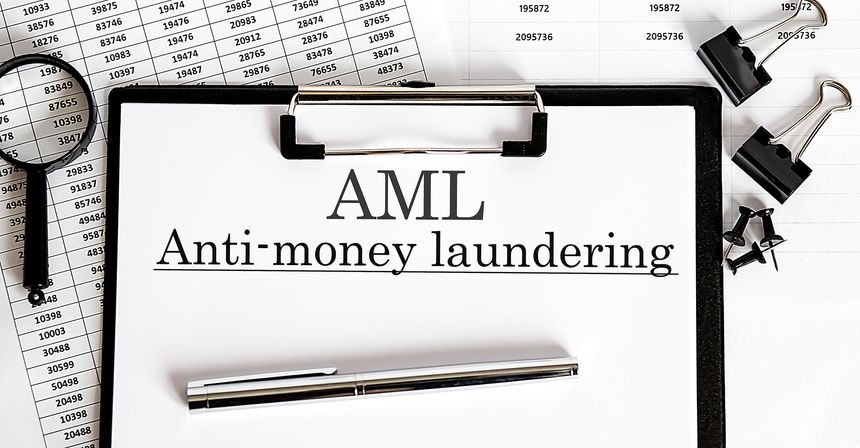 Paper with Anti-money laundering AML on chart
