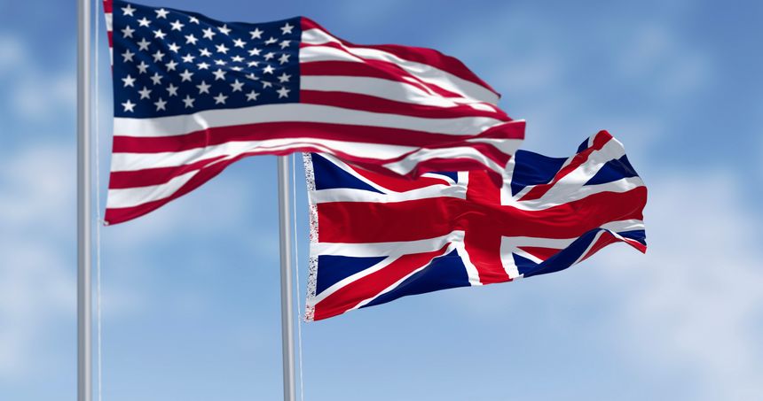 National flags of the Unites States and United Kingdom waving in the wind. 3d illustration render. Selective focus