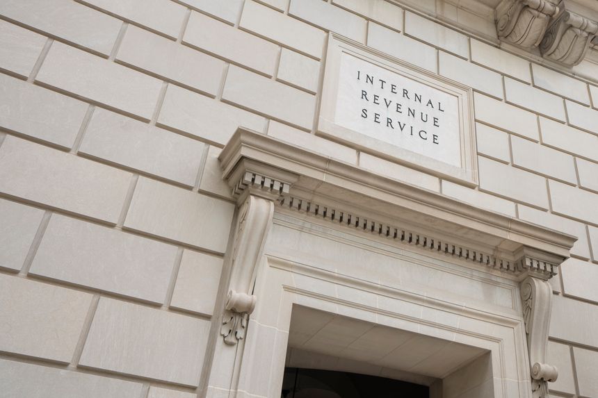 Washington, DC, USA - June 21, 2022: An entrance to the Internal Revenue Service (IRS) Headquarters Building in Washington, DC.